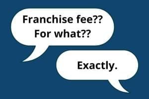 Speech balloons: "Franchise fee?? For what??" "Exactly."